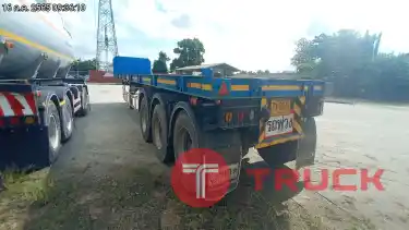 รถบรรทุก กึ่งพ่วง พื้นเรียบ 3 เพลา รหัส CT736977