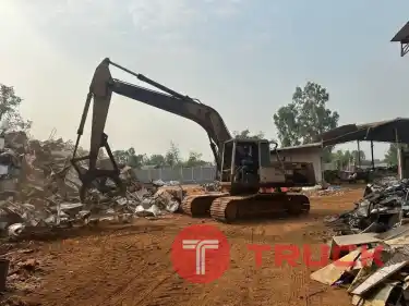 แบคโฮพร้อมหัวคีบ