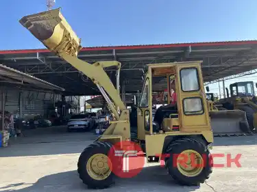 รถตักล้อยาง MITSUBISHI รุ่น WS300 บุ้งกี๋ 0.5 คิว ยกสูง 3 เมตร รถเก่านอกนำเข้า ติดต่อ Line jiraroj2909